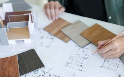 A Houston custom home builder designing the blueprints of a house